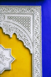 architectural ornament on bright old building wall